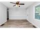 Empty bedroom with great natural light and wood-look flooring at 299 Ard Nw Pl, Atlanta, GA 30331
