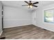 A bedroom with great natural light and wood-look flooring at 299 Ard Nw Pl, Atlanta, GA 30331