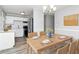 A modern dining room area showcases wood flooring and neutral tones at 299 Ard Nw Pl, Atlanta, GA 30331