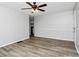 An empty living room featuring neutral paint and laminate flooring at 299 Ard Nw Pl, Atlanta, GA 30331