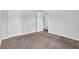 Bedroom with neutral walls and carpet with doors leading to ensuite at 3943 Brookgate Ct, Ellenwood, GA 30294
