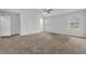 Carpeted bedroom featuring ceiling fan, neutral paint and great natural light at 3943 Brookgate Ct, Ellenwood, GA 30294