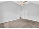 Bedroom with dual closets and neutral carpeting at 3943 Brookgate Ct, Ellenwood, GA 30294