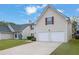 This lovely home showcases a two-car garage, neat landscaping, and comfortable suburban living at 3943 Brookgate Ct, Ellenwood, GA 30294
