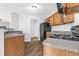Well-equipped kitchen with laminate countertops and modern appliances adjacent to the kitchen at 3943 Brookgate Ct, Ellenwood, GA 30294