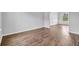 Bright living space with modern vinyl floors, light gray walls, and decorative trim at 3943 Brookgate Ct, Ellenwood, GA 30294