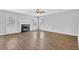 Spacious living room boasts new flooring, fresh paint, fireplace and ample natural light at 3943 Brookgate Ct, Ellenwood, GA 30294
