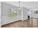 Brightly lit room featuring vinyl flooring and seamless design into the living space at 3943 Brookgate Ct, Ellenwood, GA 30294