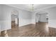 Spacious room with vinyl floors, modern trim, and an easy flow to the kitchen, great for entertaining at 3943 Brookgate Ct, Ellenwood, GA 30294