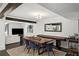 Open-concept dining area with a large wooden table, comfortable seating, and seamless access to the living room at 1152 Hampton Ne Way, Atlanta, GA 30324