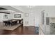 Dining room with dark wood floors, shuffleboard, and granite counters that offer a modern touch at 1152 Hampton Ne Way, Atlanta, GA 30324