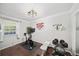 Bright exercise room featuring modern equipment and hardwood floors at 1152 Hampton Ne Way, Atlanta, GA 30324