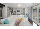 Bright living room featuring a spacious sectional, hardwood floors, and abundant natural light at 1152 Hampton Ne Way, Atlanta, GA 30324