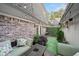 Relaxing outdoor patio features a table and comfortable seating, perfect for enjoying the outdoors at 1152 Hampton Ne Way, Atlanta, GA 30324
