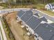 Aerial of townhome community, showing roof lines and landscaping details at 1307 Park Center Cir, Austell, GA 30168