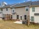 A spacious backyard with lawn, patio, and privacy fence for outdoor enjoyment and relaxation at 1307 Park Center Cir, Austell, GA 30168