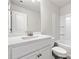 Well lit bathroom features a vanity with drawers and a shower-tub combination at 1307 Park Center Cir, Austell, GA 30168