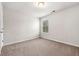 Light and airy bedroom features carpet, a window, and neutral paint at 1307 Park Center Cir, Austell, GA 30168