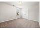 Bedroom with a double-door closet, a window, and neutral carpeting at 1307 Park Center Cir, Austell, GA 30168