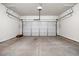 Spacious two-car garage with overhead door and opener offers secure parking and storage options at 1307 Park Center Cir, Austell, GA 30168