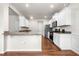 Well-lit kitchen with granite countertops and stainless steel appliances at 1307 Park Center Cir, Austell, GA 30168