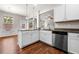Open concept kitchen and dining area with stainless steel appliances and granite countertops at 1307 Park Center Cir, Austell, GA 30168