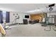 Large finished basement features a home gym area and a cozy seating area at 24 Scarlett Oak Ne Dr, Cartersville, GA 30121