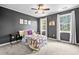 Cozy bedroom with ample natural light, carpet, and modern accents at 24 Scarlett Oak Ne Dr, Cartersville, GA 30121
