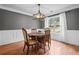 Elegant dining room with decorative lighting and window at 24 Scarlett Oak Ne Dr, Cartersville, GA 30121