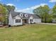 Charming two-story home with a well-manicured lawn and a three-car garage at 24 Scarlett Oak Ne Dr, Cartersville, GA 30121