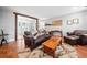 Inviting living room with hardwood floors and cozy rustic decor at 24 Scarlett Oak Ne Dr, Cartersville, GA 30121