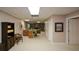 Spacious finished basement with ample storage, an entertainment area, and neutral carpet at 4455 Sirrocco Sw Ln, Lilburn, GA 30047