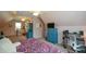 Bedroom featuring a sloped ceiling, desk, blue dresser, and lots of natural light at 4455 Sirrocco Sw Ln, Lilburn, GA 30047