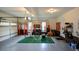 Garage transformed into a batting cage and sports training area at 4455 Sirrocco Sw Ln, Lilburn, GA 30047