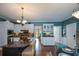 Lovely kitchen with central island, stainless appliances, and built-in cabinets at 4455 Sirrocco Sw Ln, Lilburn, GA 30047