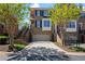 Beautiful brick townhome featuring an attached garage and well-manicured landscaping at 1016 Manchester Way # 43, Roswell, GA 30075