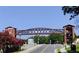 Street view of the 'Acworth' pedestrian bridge. Pedestrian bridge with brick towers and steel supports at 4454 Kentland Dr, Acworth, GA 30101