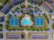Aerial view showcases a community pool, tennis courts, clubhouse, and surrounding homes at 5449 Festival Ave, Fairburn, GA 30213