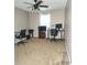 Spacious bedroom with neutral walls, a ceiling fan, and a window for natural light at 5449 Festival Ave, Fairburn, GA 30213