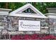 Renaissance at Southpark entrance sign on a stone base with landscaping at 5449 Festival Ave, Fairburn, GA 30213