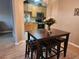 Kitchenette featuring stainless steel appliances and tile backsplash with light wood colored cabinets at 5449 Festival Ave, Fairburn, GA 30213