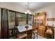 Cozy dining area with large windows offering a view of the backyard at 575 W Wayside Rd, Carrollton, GA 30116