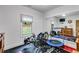 Fitness room with mirrors, equipment, and natural light at 575 W Wayside Rd, Carrollton, GA 30116