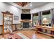 Beautiful view of the stone fireplace from the living room at 575 W Wayside Rd, Carrollton, GA 30116