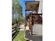Multi-level backyard deck with stairs and landscaped yard at 5990 Arbor Green Cir, Sugar Hill, GA 30518