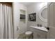 Bathroom with shower and tub, updated vanity, and modern fixtures provides a comfortable and stylish experience at 125 Ketton Xing, Johns Creek, GA 30097
