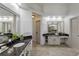 Bright bathroom featuring granite countertops, custom cabinets, and tiled floors at 125 Ketton Xing, Johns Creek, GA 30097