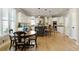 Spacious kitchen features an island with bar seating, stainless steel appliances, and ample counter space at 125 Ketton Xing, Johns Creek, GA 30097