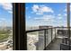 Relax on the balcony with stunning skyline views of the city and beautiful blue skies at 270 17Th Nw St # 3604, Atlanta, GA 30363