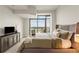 Bedroom with plush carpet and furnishings, and balcony with city view at 270 17Th Nw St # 3604, Atlanta, GA 30363
